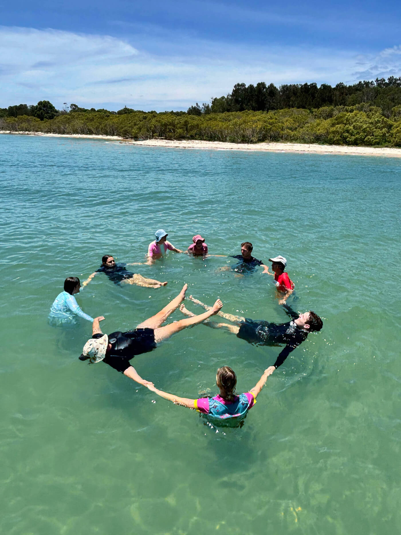 Group of people floating on the water